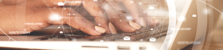 hand typing on a laptop